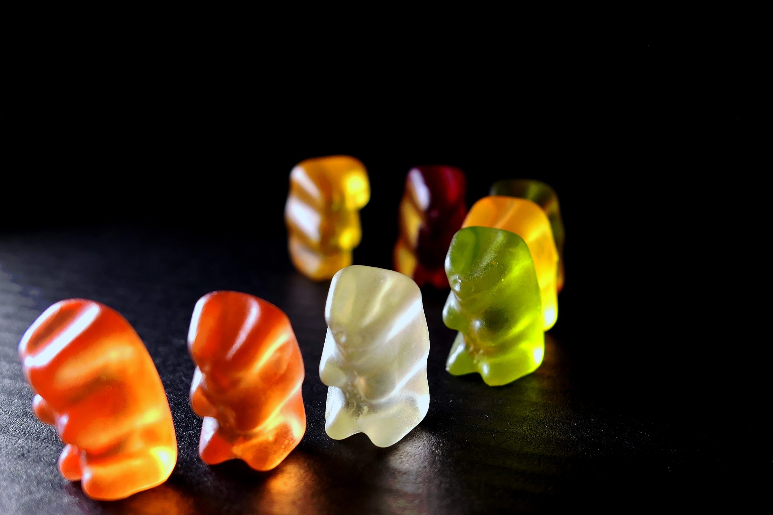 Free image/jpeg Resolution: 5472x3648, File size: 1.38Mb, Colorful candy bears at dark background